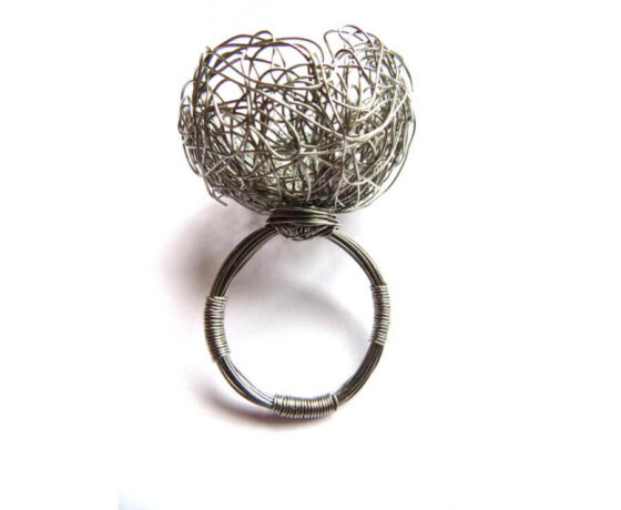 A Cocktail Ring Of Stainless Steel. Low tech: stainless steel wire A Cocktail Ring Of Stainless Steel. Low tech: stainless steel wire